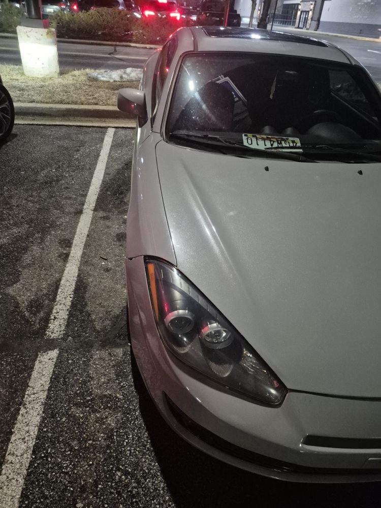 Vehicle at night in a Maryland parking lot after an auto lockout